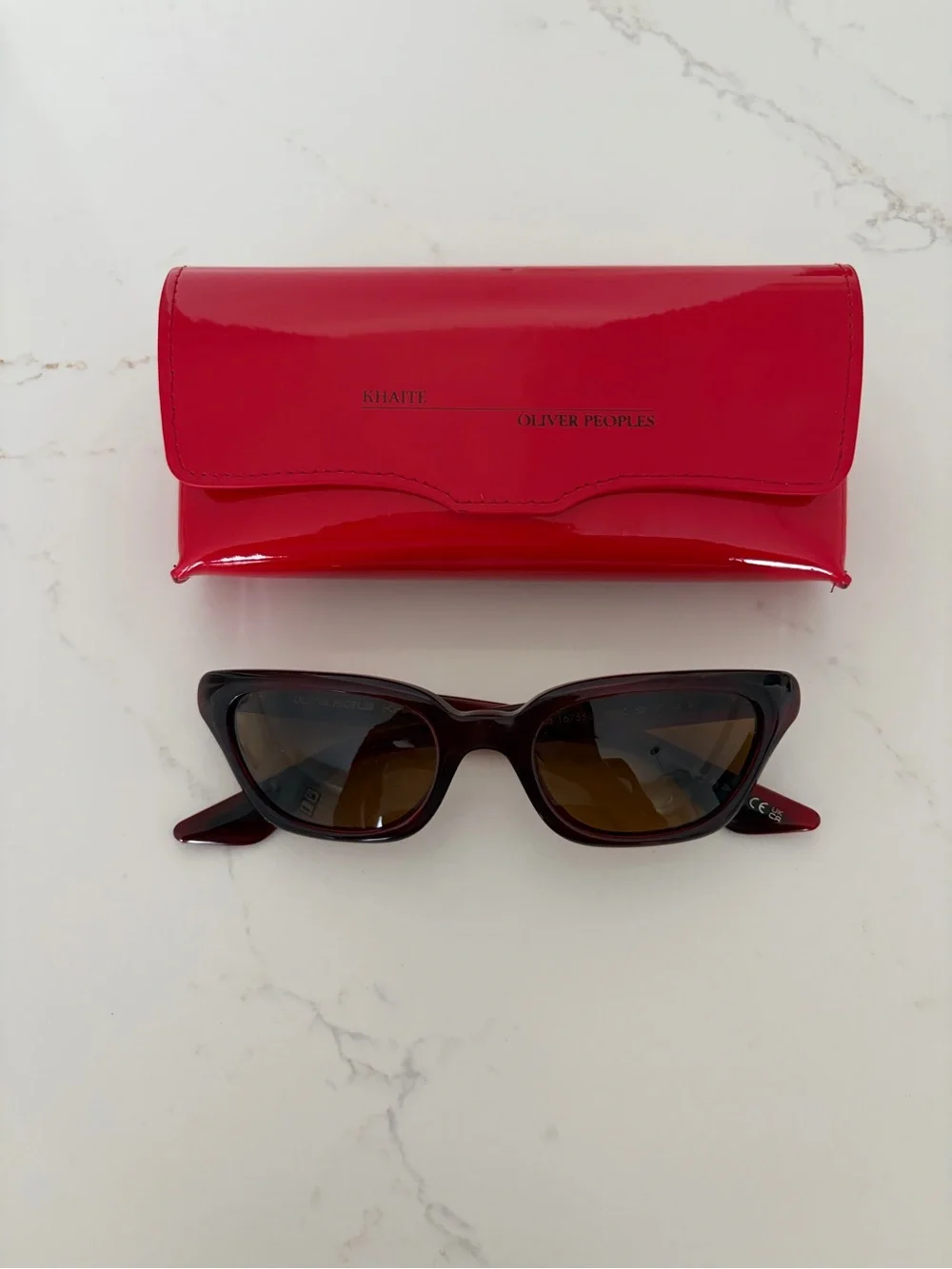 KHAITE X OLIVER PEOPLES red sunglasses